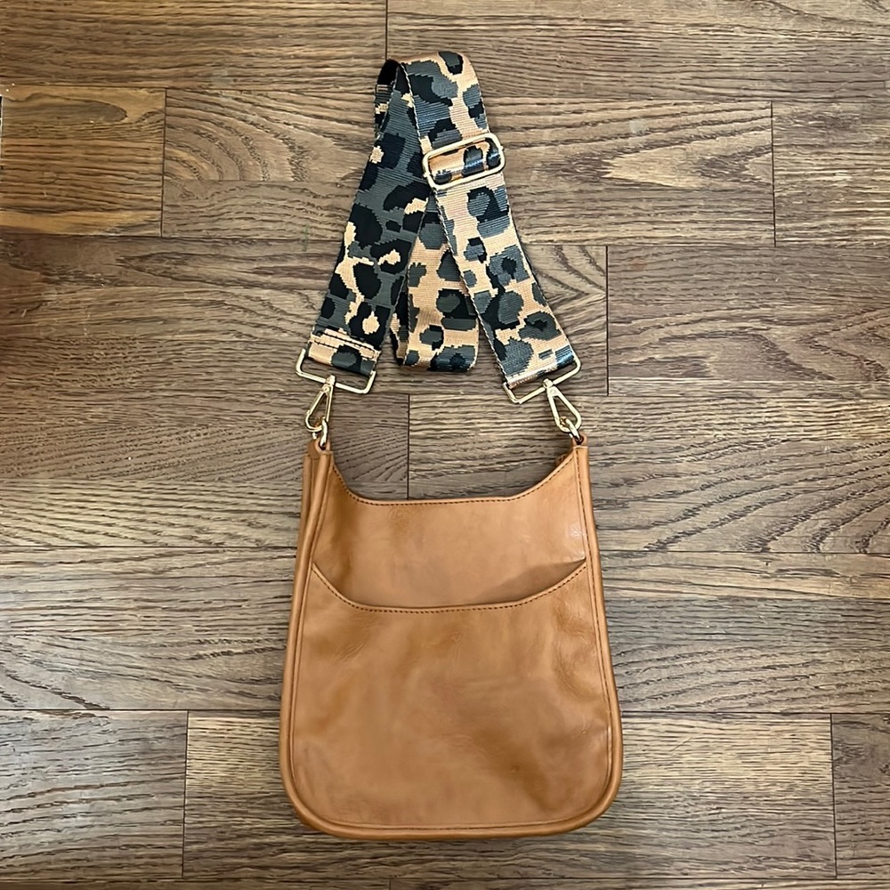 Ahdorned faux leather crossbody handbag